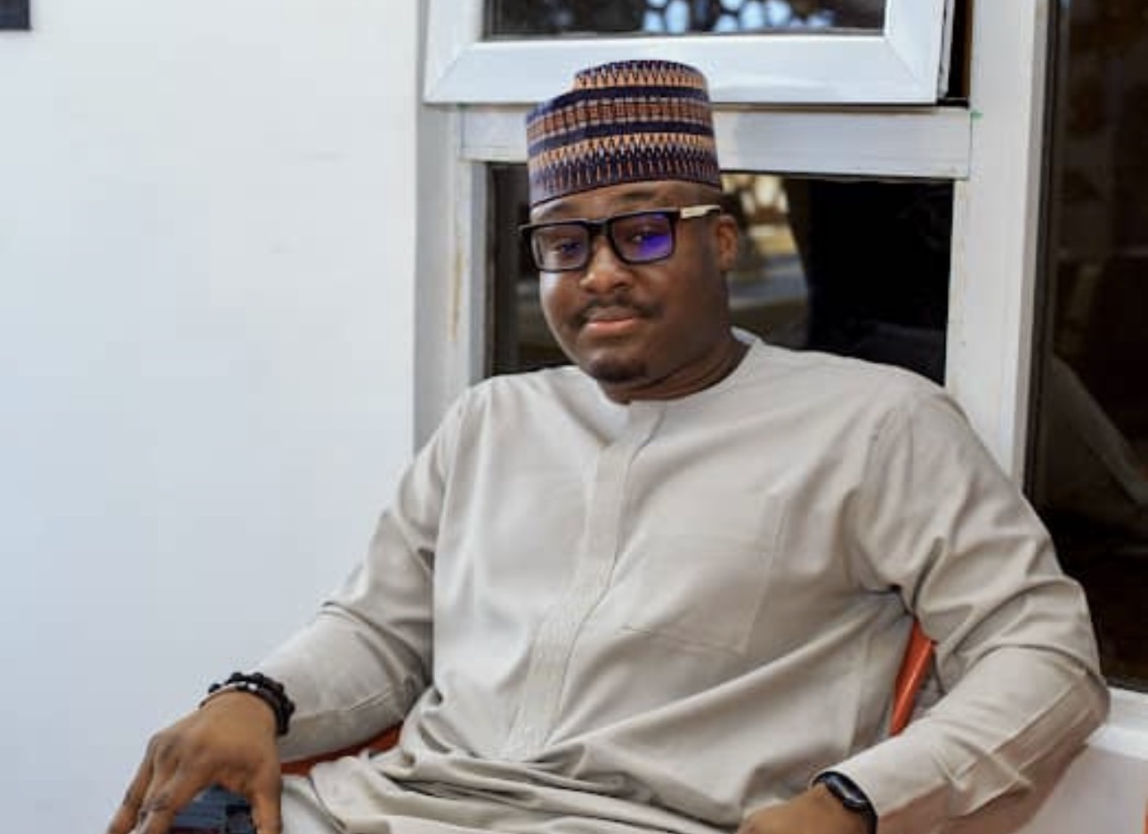 AJ relaxing in traditional attire